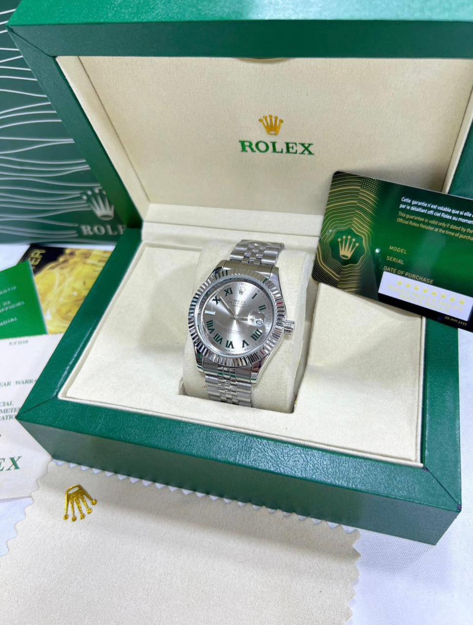 Rolex + boite + sachet