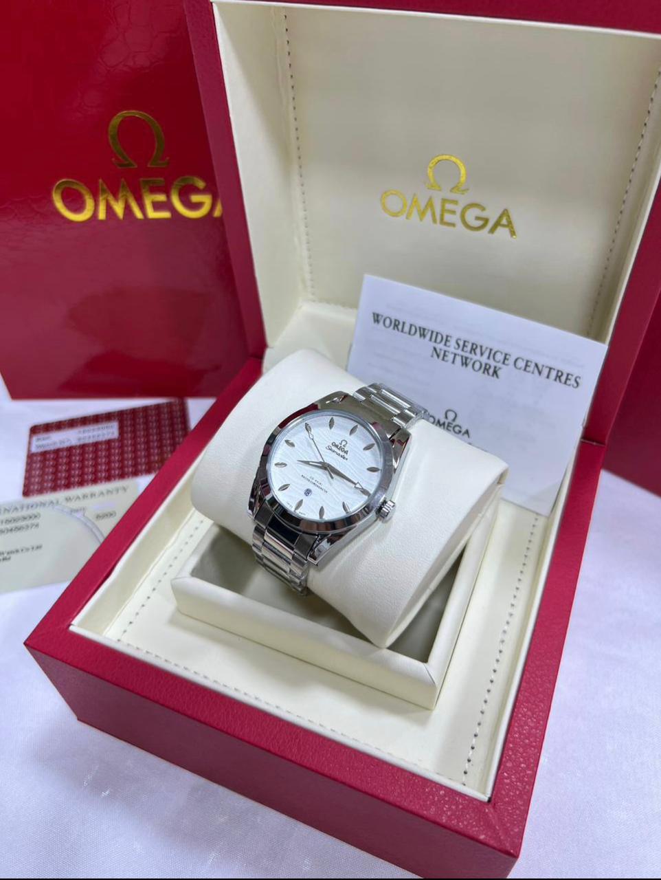 Omega + boite + sachet